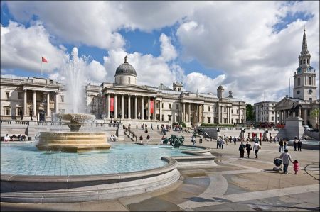 Tourists at Trafalgar Square, London